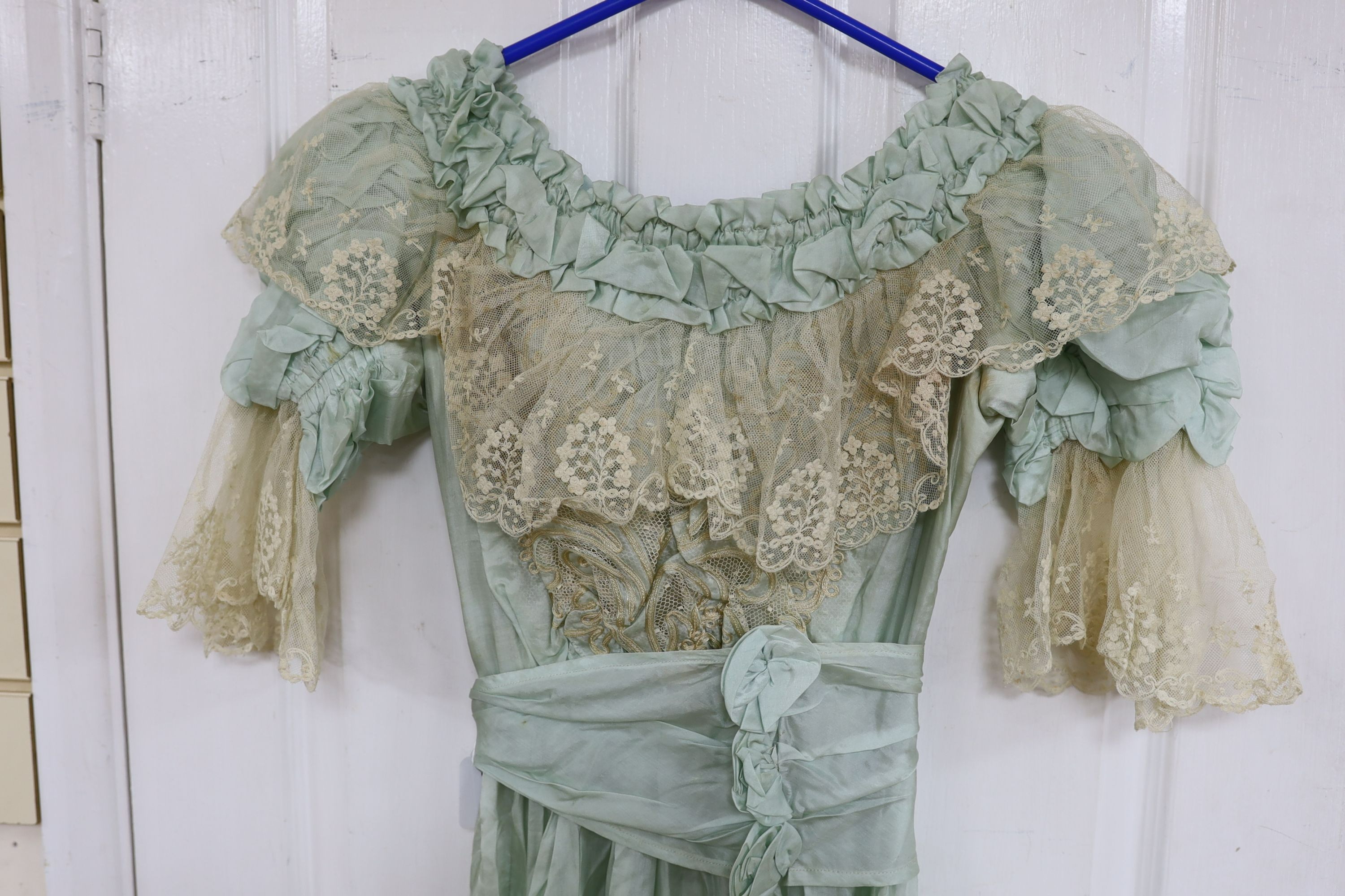 An Edwardian fine turquoise silk and ecru embroidered and lace ladies dress